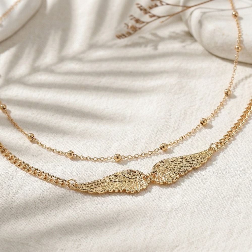 Elegante dubbele laag vleugels - Body Jewellery recensie en prijs